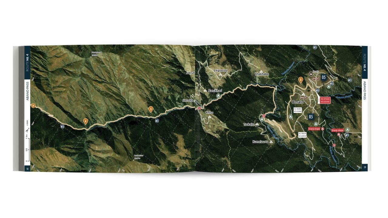 Aerial view of a winding road through forests and mountains, with points of interest, trails and facilities marked on the right-hand side of the image.