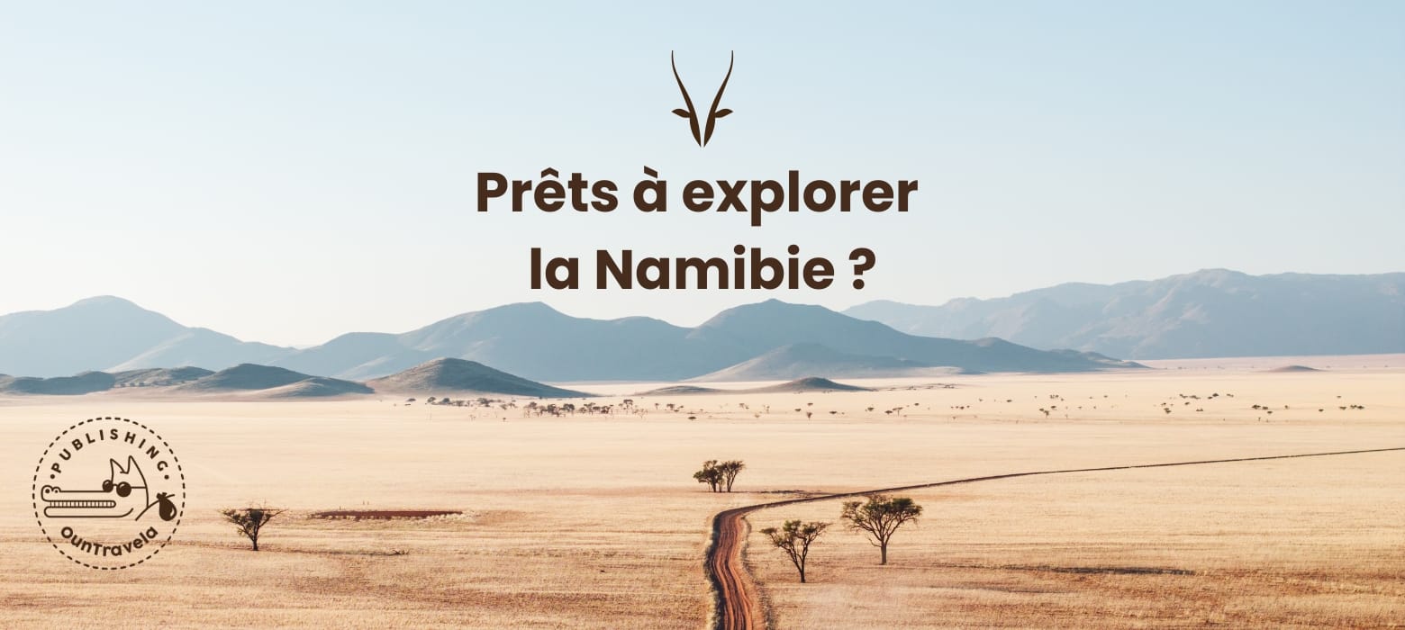 prets-a-explorer-namibie Une voiture roule sur un chemin de terre vers d'anciennes ruines en pierre sur une colline herbeuse en Géorgie. Le texte en français indique "Prêts à explorer la Géorgie ?" avec, à gauche, le logo d'une montagne et un cachet d'éditeur.